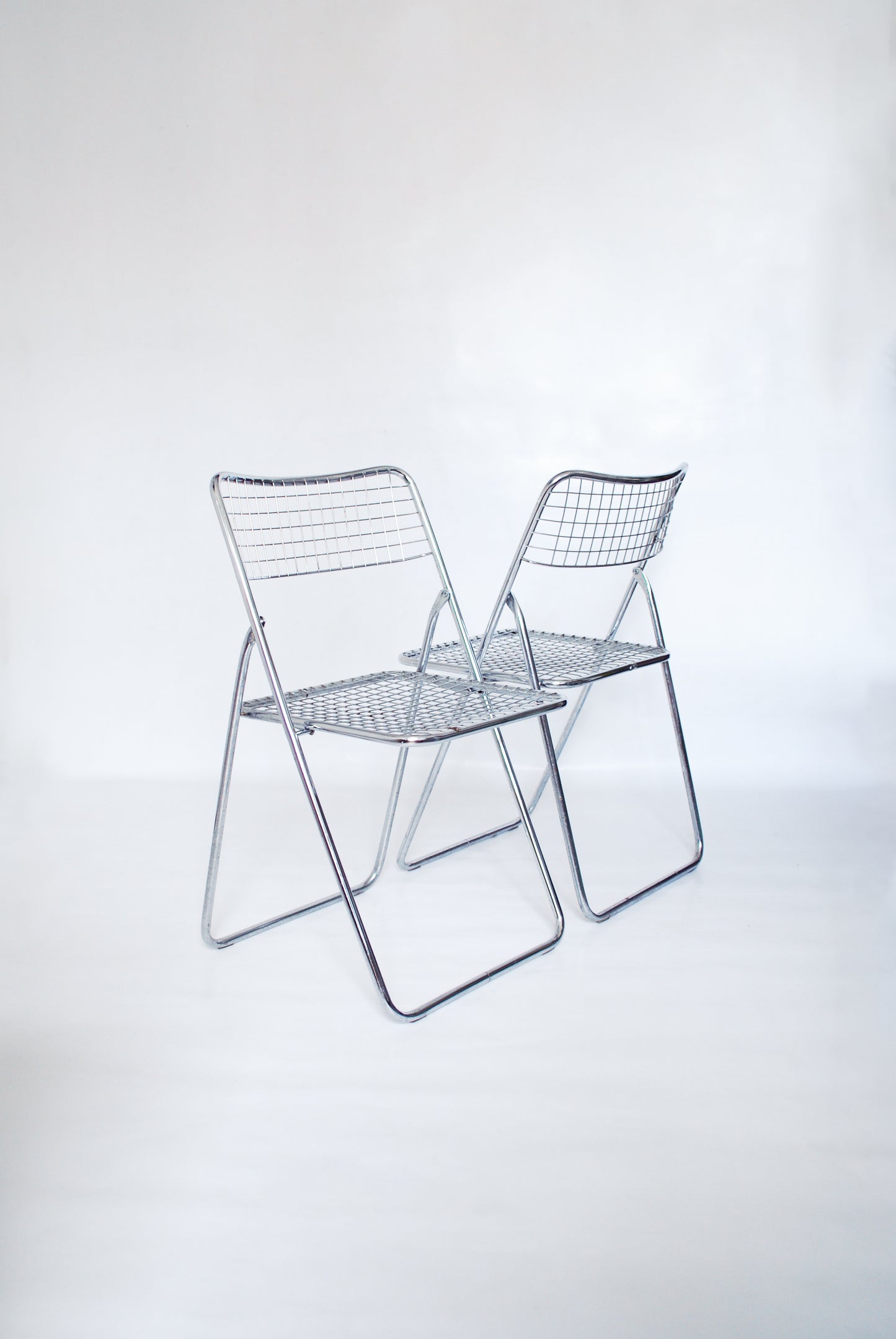 Chrome "Ted Net" metal wire folding chairs Niels Gammelgaard for IKEA 1976