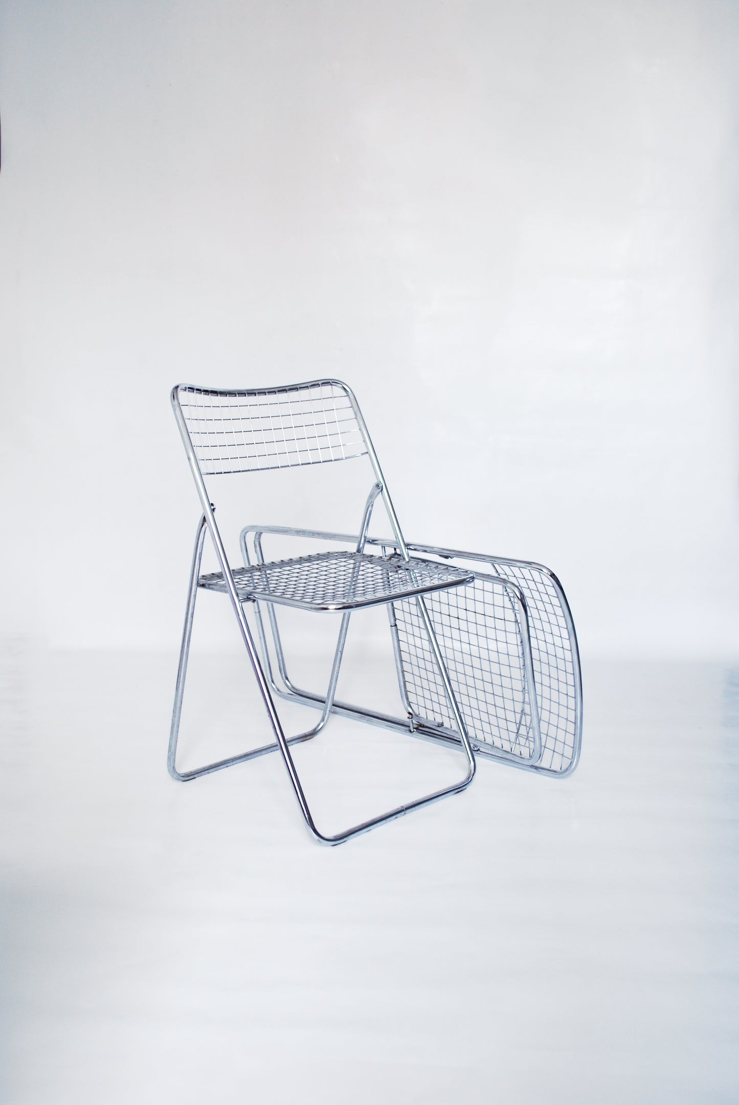 Chrome "Ted Net" metal wire folding chairs Niels Gammelgaard for IKEA 1976
