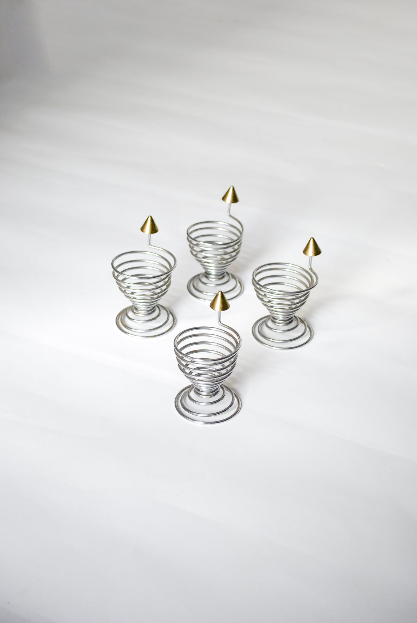 Spiral egg cups w/ piercing tips Unknown, 1990s