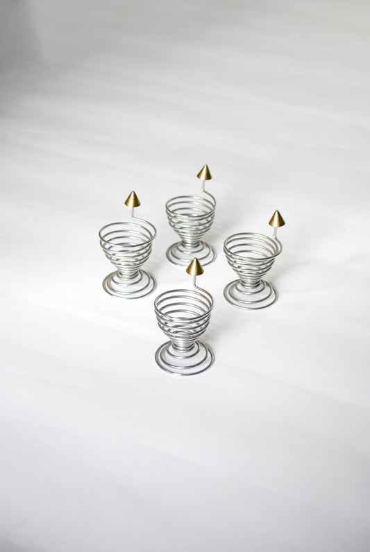 Spiral egg cups w/ piercing tips Unknown, 1990s