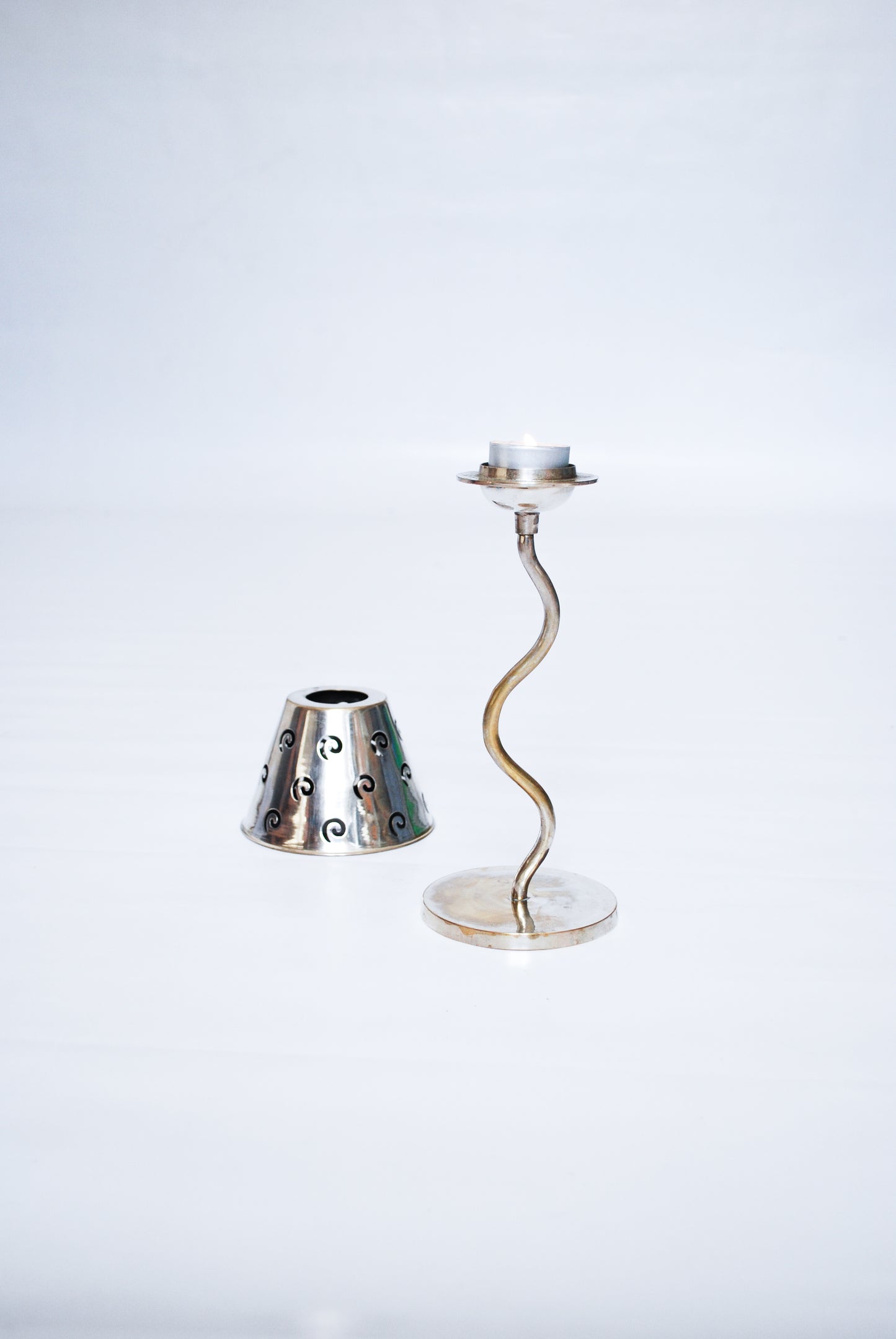 Curved silver table candle light Unknown, 1990s