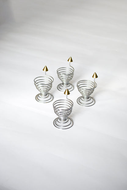 Spiral egg cups w/ piercing tips Unknown, 1990s